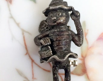 Vintage Bee scatter pin wearing a dress ,hat and carrying a purse Pewter