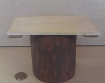 One sixth, or play scale, miniature model of a post apocalyptic coffee table.
