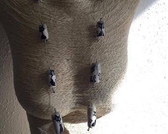 Cat necklace that glows in the night