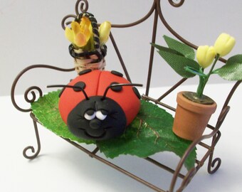 Ladybug on her miniature bench ,fairy garden, gnome or terrariums