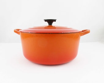 A 'Le Creuset' Dutch Oven - Enameled Cast Iron - Burnt Orange Color - Side Handles - Le Creuset - French Cuisine - Country Kitchen - France