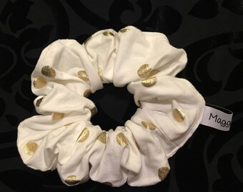 White with gold dots