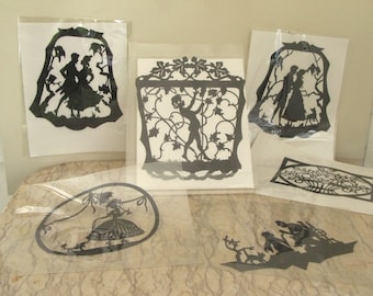 group of vintage 1920's paper silhouettes