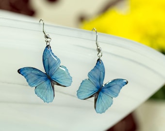 Blue morpho butterfly earrings, translucent. Looks like real butterfly. Comes in a gift box.