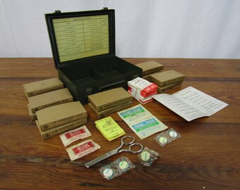 Bell Systems First Aid Kit partially full with extras