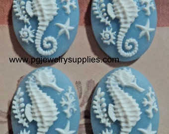 25mm x 18mm oval resin seahorse cameos white on blue sea horses 4 pieces lot l