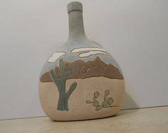 Southwestern Bottle decorated with a Desert scene.