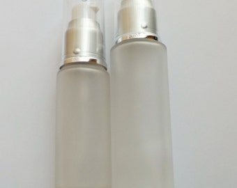 30ml or 50ml Frosted glass Bottles with white lotion pump, silver collar, and clear overcap