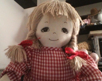Rag doll with red dress