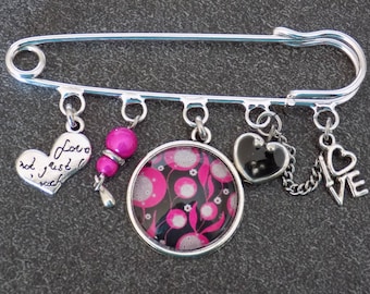 Love theme silver brooch
