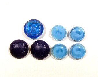7 Vintage blue glass sewing buttons