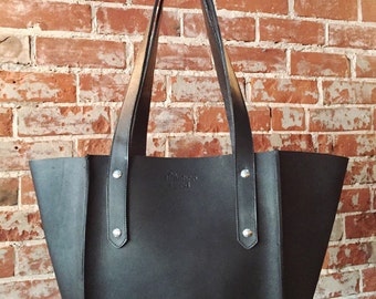 The Small Seamed Tote (pictured in Black leather)
