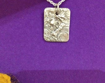 Small reticulated silver pendant