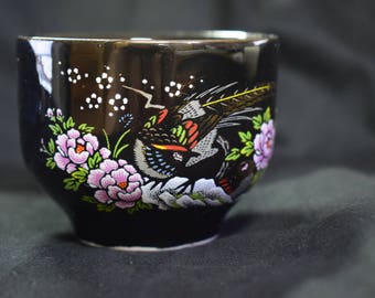 Artistisan Black bowl with intricate and finely crafted design