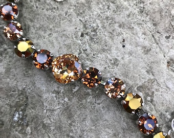 12 and 8mm brown tone swarovski bracelet
