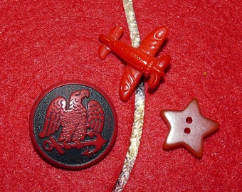 Fun Group of "Goofie" Red Buttons, Plane, Bakelite Star, and a Red Eagle