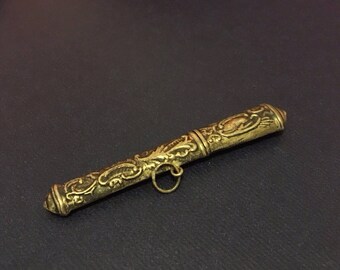 For the Woman that has EVERYTHING ! Vintage sterling silver needle case, beautiful details. Marked 925. Case measures 3" long.