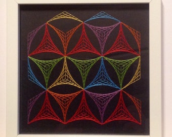 Framed geometric thread / string art