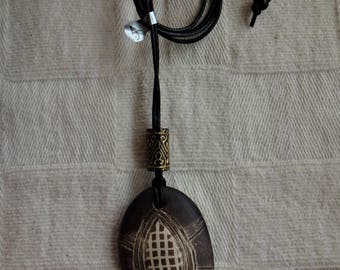 Handmade ceramic pendant/jewellery/unique/jewelry/boho/pottery/leather and wood