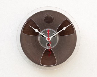 Recycled magnetic tape reel clock