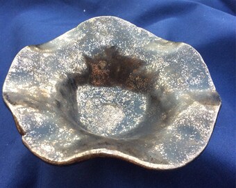 Hand made ceramic trinket bowl in burnished gold