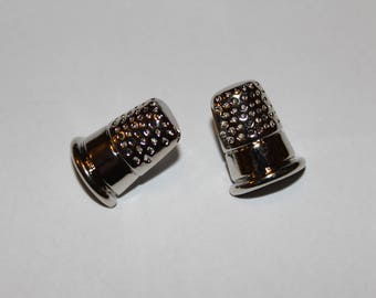 Fancy button with "thimble" sewing pattern