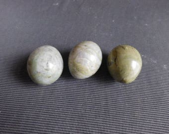 Suite of three stone eggs is number 2