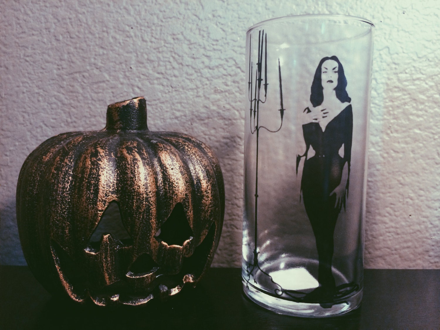 Vampira glass vase candle holder.