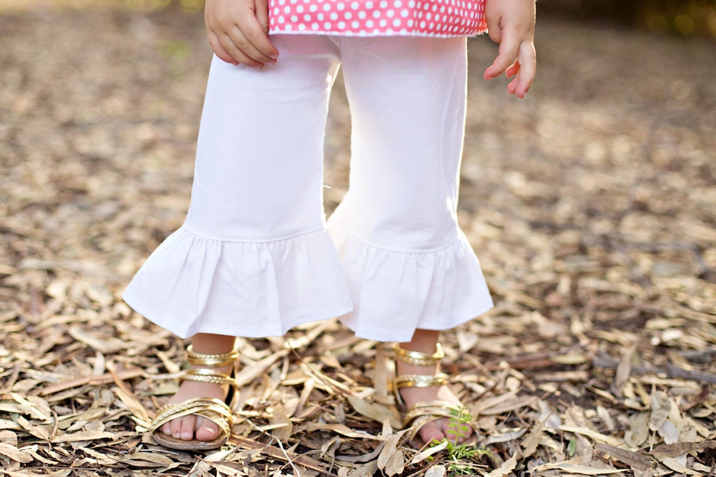 white ruffle pants