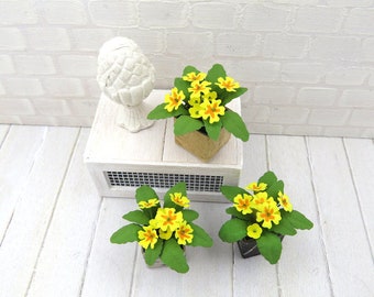 Pot of yellow primroses for dollhouse in 1:12 scale