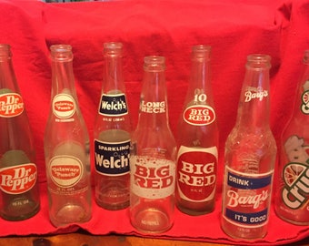 Old Collectable soda bottles. Dr. Pepper, Delaware punch, Big Red.