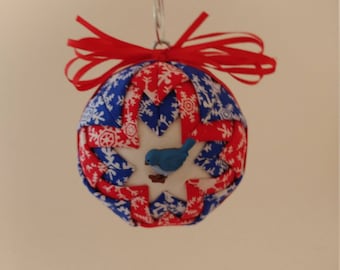 Red, blue & white folded fabric handmade ornament with blue bird decoration