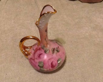 Hand painted ceramic vase.