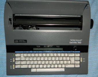 Smith Corona Electronic Typewriter # DeVille 750 with Keyboard Cover