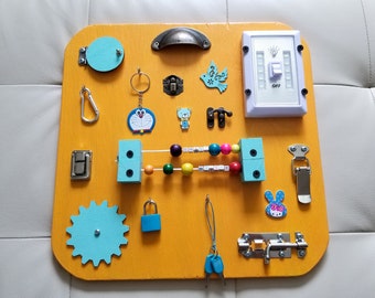 Travel Busy Board. Activity board, early development Montessori educational toy.