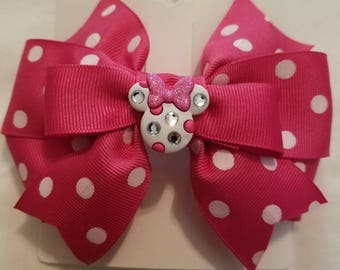 Pink and White polka dot Minnie Mouse bow.