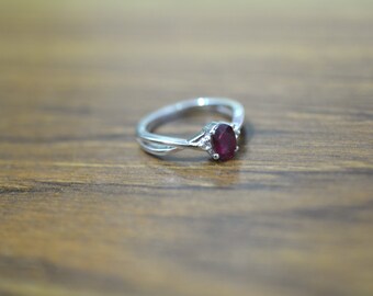 Beautiful red garnet diamond ring