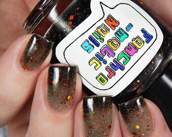 The Maze Nail Polish - thermal black-to-clear with copper holo glitter