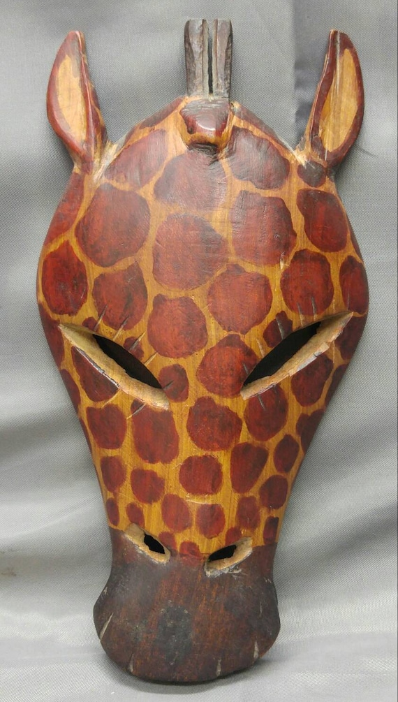 Old vintage hand carved wooden giraffe mask Kenya Africa