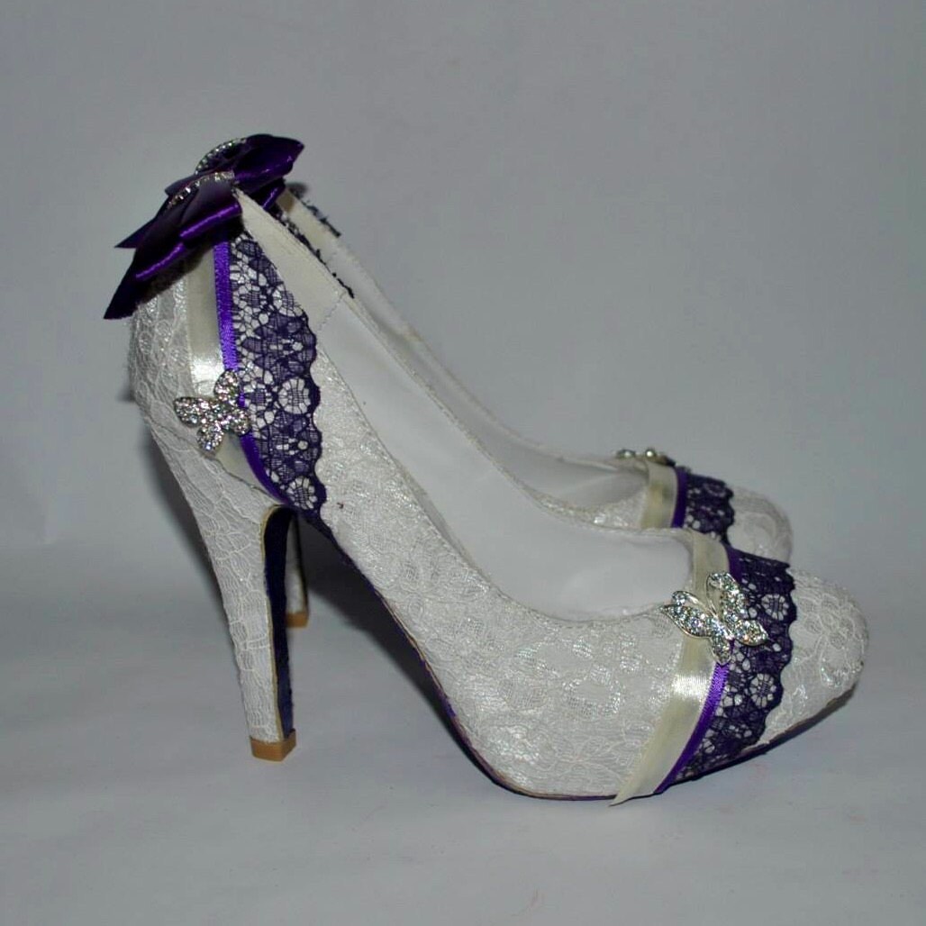 Soft satin shoes with an elegant vintage lace overly. The toe is finished with a beautiful purple trim