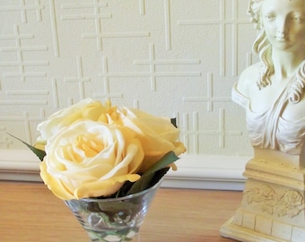 Silk flower arrangement of real-touch roses in glass bowl set in acrylic water