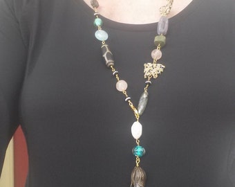 Long strand beaded adjustable strand necklace