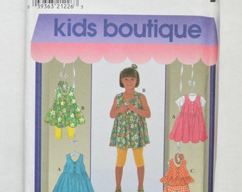 1990s UNCUT Simplicity Kids Boutique Sewing Pattern 7991 Childrens Summer Dress, Elastic Waist Shorts, Leggings, & Pullover Top Size 2,3,4