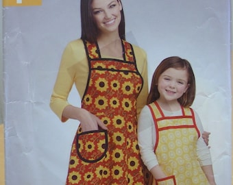 Simplicity 0758 or 1056 super simple apron sewing pattern for adult and child. All sizes.