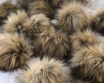 Faux fur pom poms in *Coyote* fur pom poms, fur poms, beanie pom poms, toque pom poms, hat pom poms, scarf pom poms