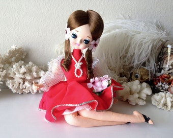Vintage pose doll retro Japan seated lounging big eye girl doll stockinette figure
