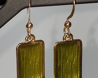peridot colored enaimal earrinds