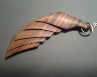 Unfold pendant, hand-sculpted goncalo-alves hardwood
