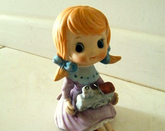 Vintage 1980's ceramic porcelain little red haired girl holding train ornament
