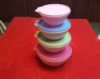 Vintage Tupperware sheer nestings bowls / set of 4 different sizes with different colored lids